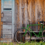 Old wooden wall and green bicycle